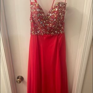 Mori Lee. Red beaded strapless gown.